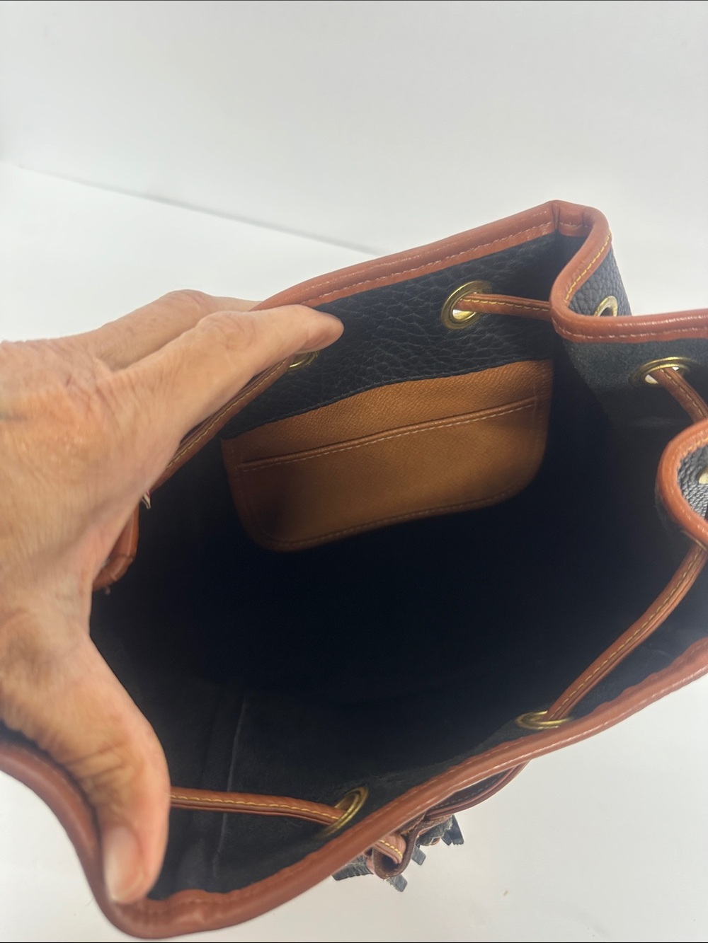 Dooney & Bourke Black Pebbled Leather Drawstring Bucket Bag with Tan Trim - Picture 10 of 13